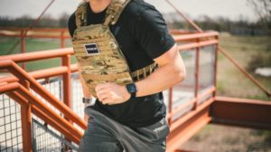 Man running in Rogue Fitness Vest