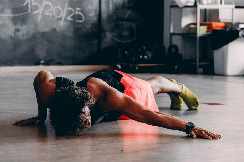 Man doing a push up plank variation